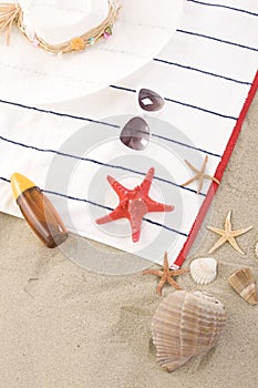 Beach items on sand for fun summer
