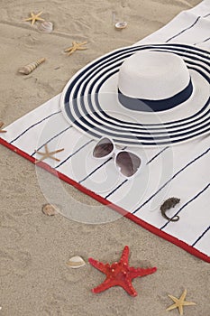 Beach items on sand for fun summer