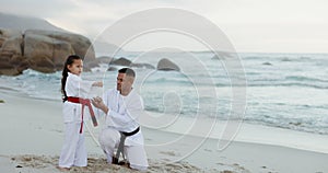 Beach, karate sport or child learning martial arts, fighting or taekwondo in fitness coaching. Challenge, kung fu or