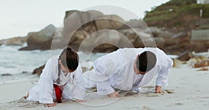 Beach, karate training or child learning martial arts fighting or taekwondo in fitness workout or push ups. Challenge