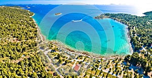 Beach of Kosirna turquoise bay on Murter island aerial panoramic view