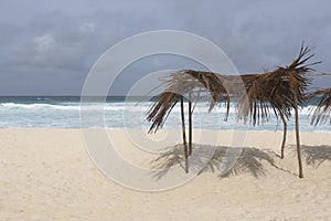 Beach at La Dique island with sun protection, Seychelles