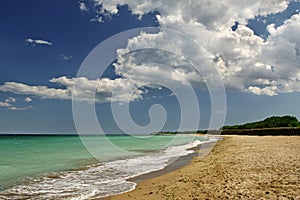 Beach landscape with clouds and sand