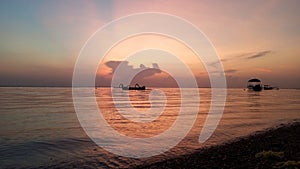 Beach landscape view background. Morning light and romantic sunrise sky scenery over the sea. Sanur Beach, Bali, Indonesia