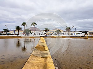 Beach landscape and wooden walkway to get from the beach to the interior. Canary Islands, Spain