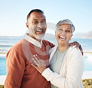 Beach, laughing and portrait of senior couple on vacation or holiday together with love in nature at sea or ocean