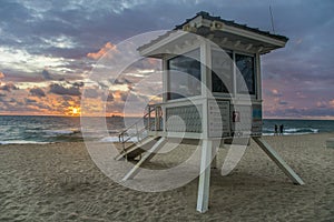 Beach lifeguard stand during beautiful sunrise