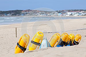 Beach with lifesaving flotation devices