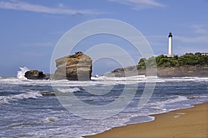 Beach and lighthouse at Biarritz in France
