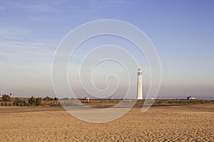 Beach and lighthouse in Morro Jable, Fuerteventura, Spain