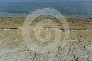 A beach with a lot of rocks on the Kalanggaman island.