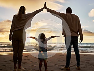 Beach, love and family in unity together while on summer vacation, journey or adventure at the sea. Mother, father and