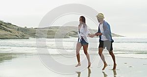 Beach, love and happy couple holding hands, running and bonding on tropical journey from island water, ocean or sea