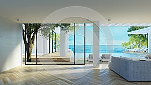 Beach luxury living room and Sea   view interior - 3d rendering