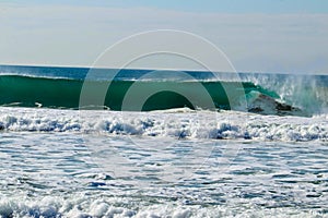 Beach with many waves, Lisbon, Portugal