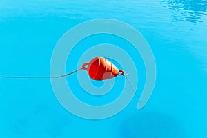 Beach marker buoys in sea