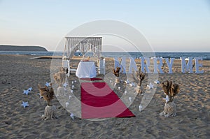 Beach marriage proposal on romantic dinner at sunset
