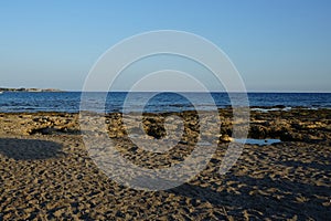 Beach on the Mediterranean coast in Pefkos or Pefki, Rhodes island, Greece