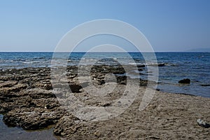 Beach on the Mediterranean coast in Pefkos or Pefki, Rhodes island, Greece