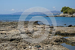 Beach on the Mediterranean coast in Pefkos or Pefki, Rhodes island, Greece