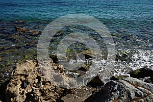 Beach on the Mediterranean coast in Pefkos or Pefki, Rhodes island, Greece