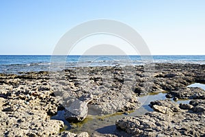 Beach on the Mediterranean coast in Pefkos or Pefki, Rhodes island, Greece