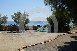 Beach on the Mediterranean coast in Pefkos or Pefki, Rhodes island, Greece