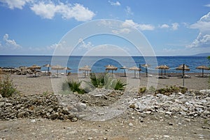 Beach on the Mediterranean coast in Pefkos or Pefki, Rhodes island, Greece