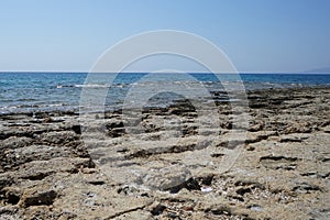 Beach on the Mediterranean coast in Pefkos or Pefki, Rhodes island, Greece