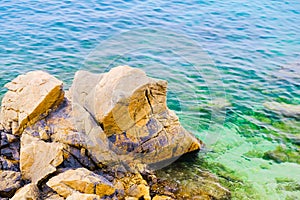 Beach of Mediterranean Sea with rocks in Lloret de Mar, Costa Brava