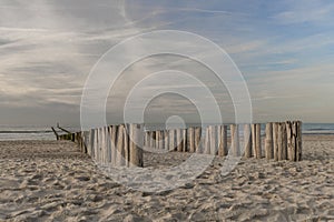 Beach near Domburg town in spring fresh morning with cloudy sky