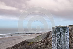 Beach near Domburg town in spring fresh morning with cloudy sky