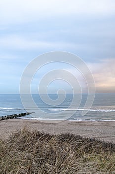 Beach near Domburg town in spring fresh morning with cloudy sky