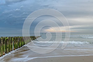 Beach near Domburg town in spring fresh morning with cloudy sky