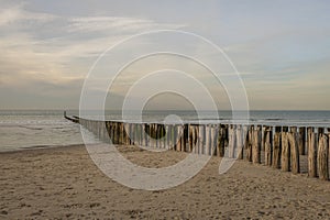 Beach near Domburg town in spring fresh morning with cloudy sky