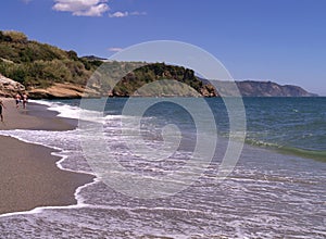 Beach in Nerja, a sleepy Spanish Holiday resort on the Costa Del Sol near Malaga, Andalucia, Spain, Europe