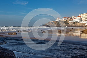 Beach on ocean coast, moviment waves with foam. photo