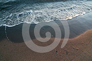 BEACH IN OREGON WITH RUNING WATER