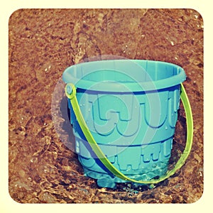 Beach pail in the sea
