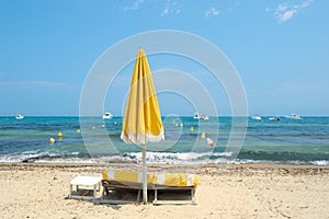 Beach with parasols and beds