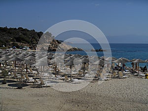 Beach and parasols near sea