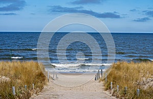 beach path sand dunes and sea