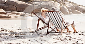 The beach is the perfect place for a couples retreat. Full length shot of an affectionate middle aged couple relaxing on