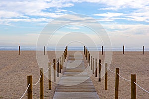Wooden pathway to the sea in Arenys de Mar photo