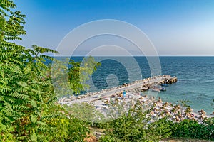 A beach and a pier in Nessebar ancient city, one of the major seaside resorts on the Bulgarian Black Sea Coast. Nesebar, Nesebr is