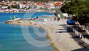 Beach with pines in Vodice, Croatia.