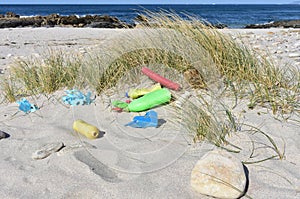 Beach with plastic pollution at famous Rias Baixas Region. Galicia, Spain.