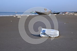 Beach plastics pollution, ocean garbage, environmental damage