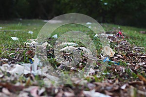 Beach pollution. Plastic bottles and other trash on sea beach. Ecological concept. earth day concept.globe pollution. Garbage on