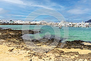 Beach and port in Caleta del Sebo, La Graciosa, Canary Islands, Spain